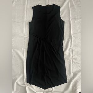 Elie Tahari black dress with flattering front side gather.